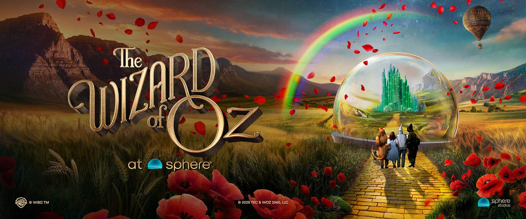 The Wizard of Oz at Sphere poster showing the main characters on the yellow brick road heading towards the Emerald City.